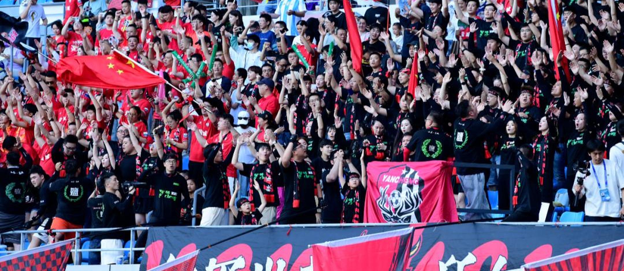 中国足球赛事再次点燃球迷激情 中国足球赛事再次点燃球迷激情